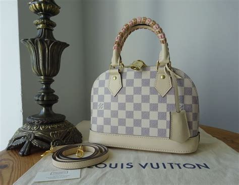 louis vuitton braided handle bag|louis vuitton alma damier.